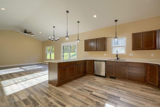 32360 Redbud Ln, Logan, OH 43138 - kitchen featuring stainless steel dishwasher, a peninsula, vaulted ceiling, light wood finished floors, and light countertops