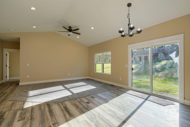 32360 Redbud Ln, Logan, OH 43138 - unfurnished room featuring wood finished floors, ceiling fan, a chandelier, vaulted ceiling, and recessed lighting