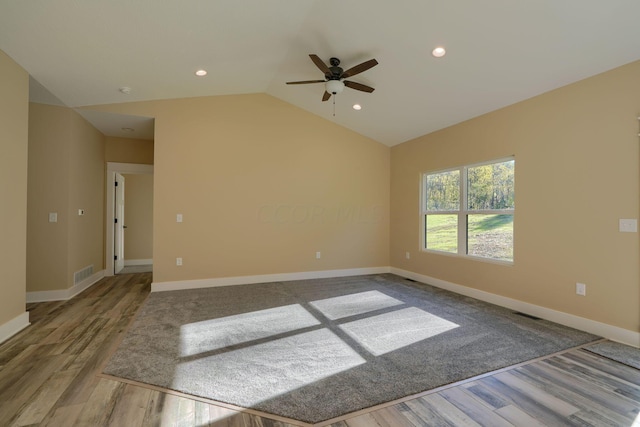32360 Redbud Ln, Logan, OH 43138 - spare room featuring a ceiling fan, wood finished floors, vaulted ceiling, and recessed lighting