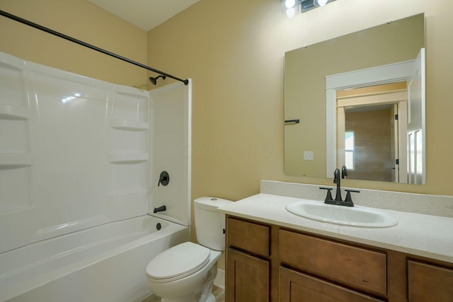 full bathroom featuring shower / tub combination, vanity, and toilet