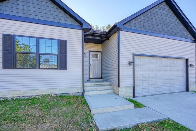 32360 Redbud Ln, Logan, OH 43138 - view of front facade featuring an attached garage and driveway