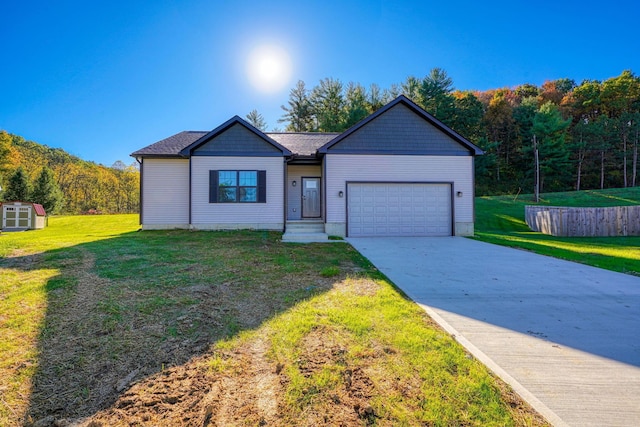 32360 Redbud Ln, Logan, OH 43138 - single story home featuring a garage, a front lawn, concrete driveway, and a storage shed