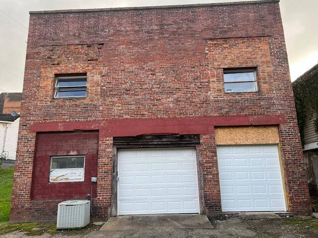 garage featuring central air condition unit