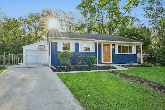 ranch-style home featuring a front lawn and a garage