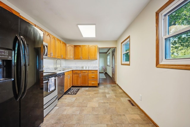 kitchen with sink and stainless steel appliances