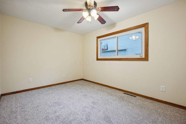 carpeted empty room with ceiling fan