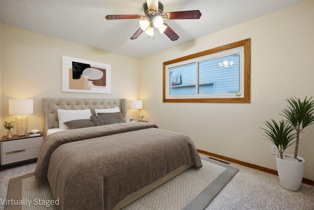 carpeted bedroom with ceiling fan