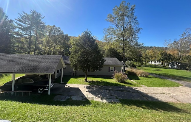 view of yard with a carport