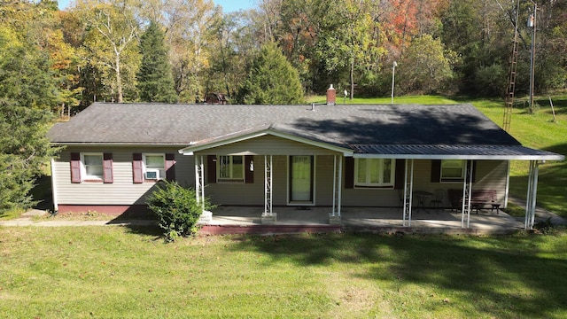 view of front of property with covered porch, cooling unit, a patio area, and a front lawn