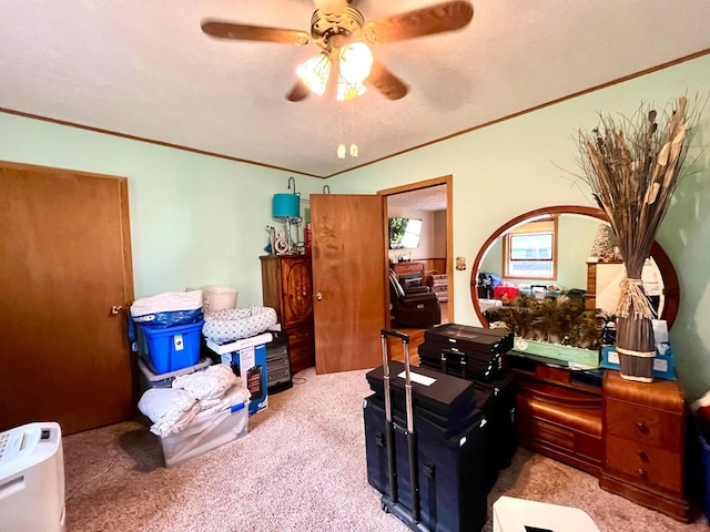 interior space with ceiling fan and a textured ceiling