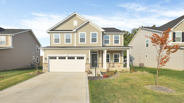 craftsman inspired home featuring central AC, covered porch, a front yard, and a garage