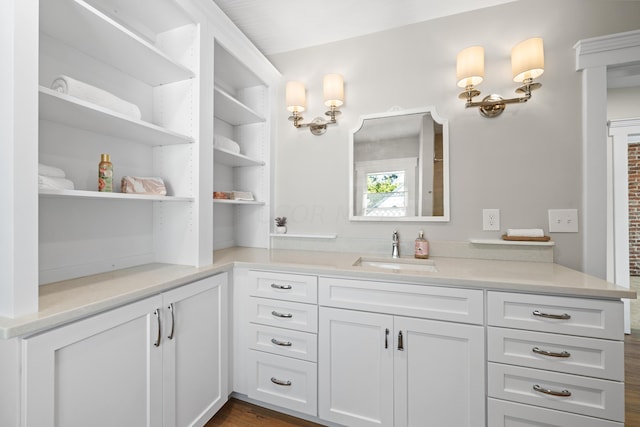 bathroom with vanity and hardwood / wood-style flooring