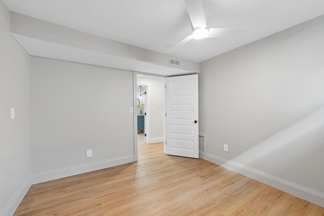 spare room with light wood-type flooring