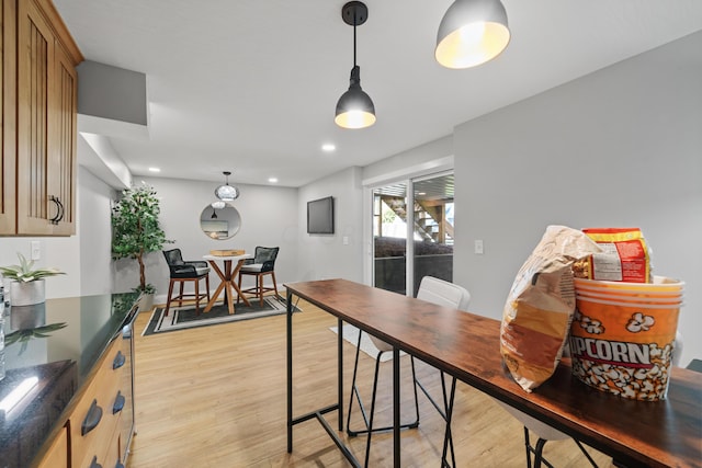 dining area with light wood-type flooring