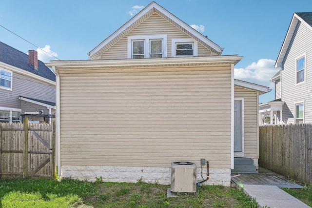 view of home's exterior featuring cooling unit