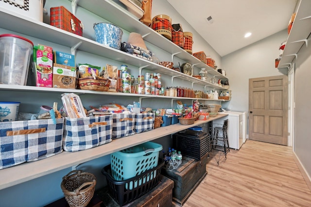 pantry featuring washer and dryer