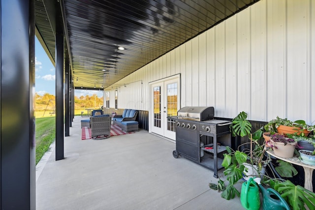 view of patio / terrace featuring outdoor lounge area, area for grilling, and french doors