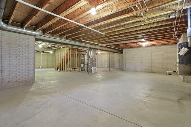 unfinished basement with brick wall