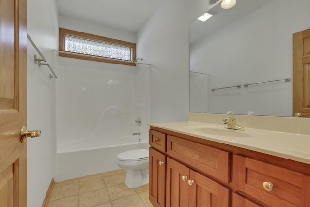 bathroom featuring washtub / shower combination, vanity, tile patterned flooring, and toilet