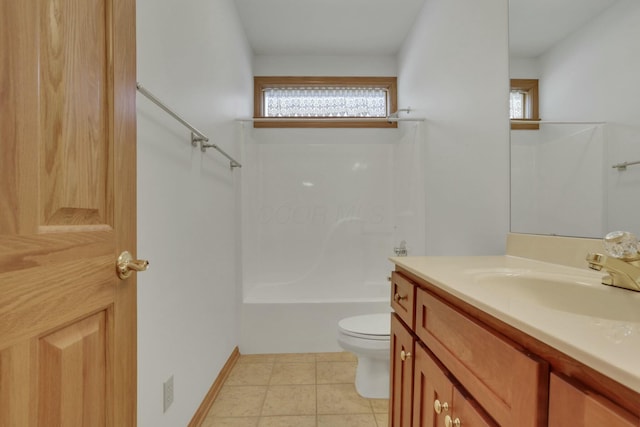 bathroom with bathing tub / shower combination, toilet, vanity, tile patterned flooring, and baseboards