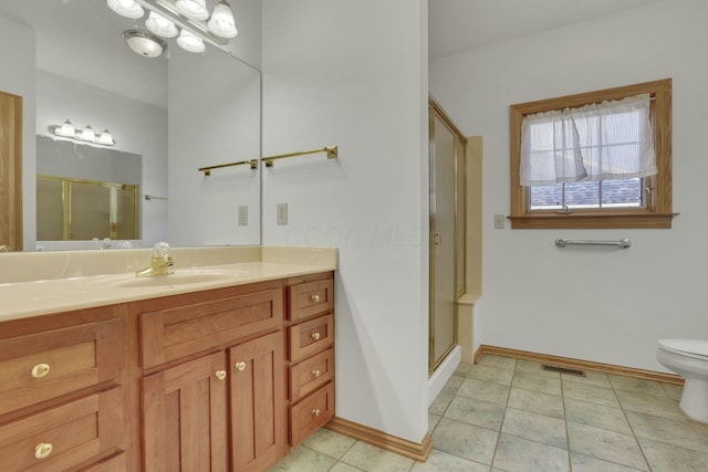 full bathroom featuring visible vents, toilet, a stall shower, vanity, and tile patterned floors