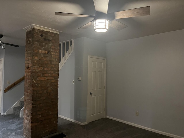 additional living space featuring ceiling fan and dark colored carpet