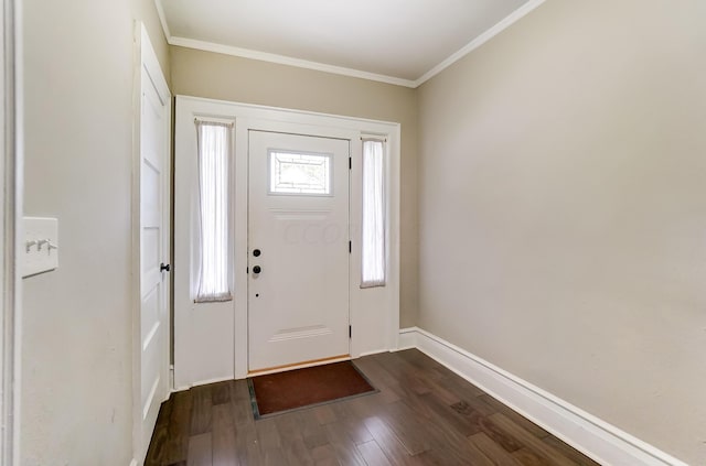 foyer featuring hardwood / wood-style flooring and ornamental molding