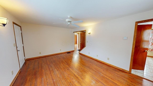 unfurnished room featuring wood-type flooring and ceiling fan