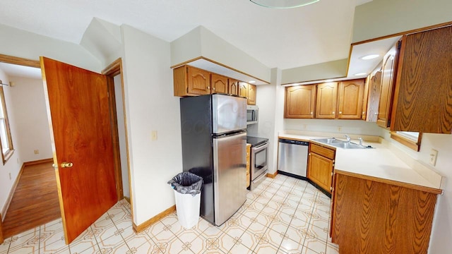 kitchen featuring appliances with stainless steel finishes and sink