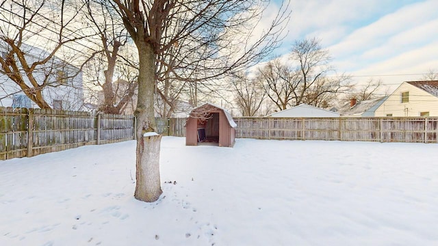 view of yard layered in snow