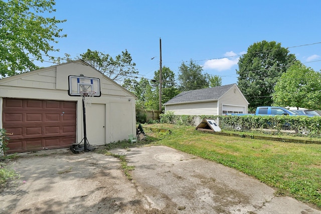 garage featuring a yard