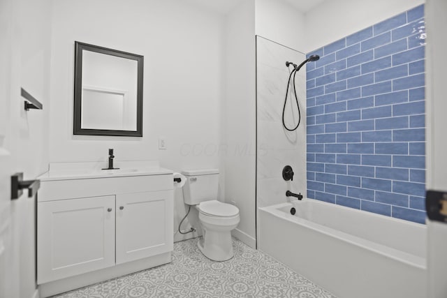 full bathroom featuring vanity, toilet, and tiled shower / bath