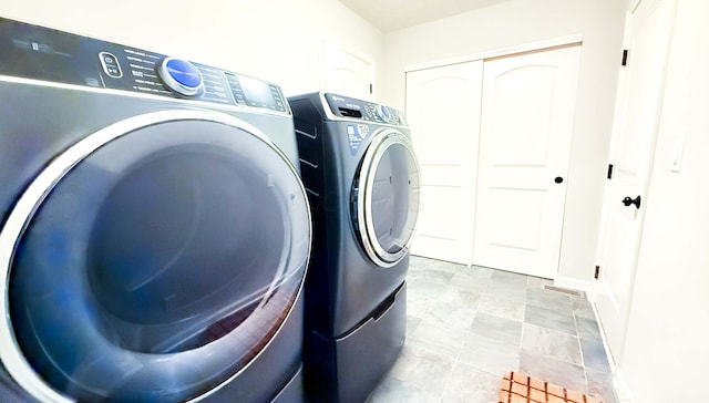 laundry area featuring independent washer and dryer