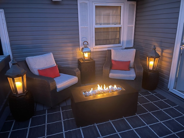 view of patio with an outdoor fire pit