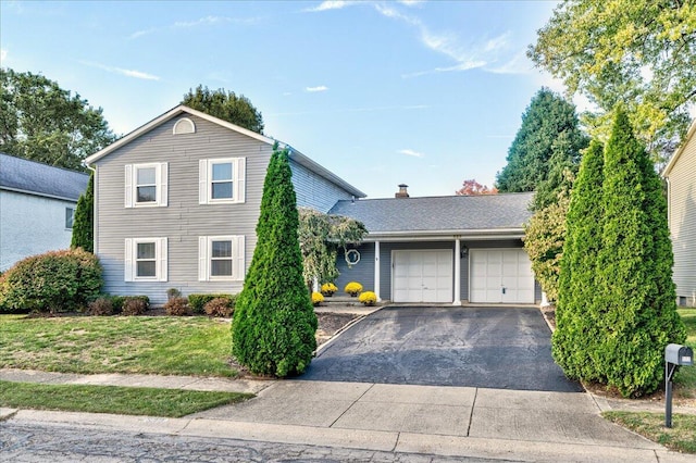 view of front of house with a garage