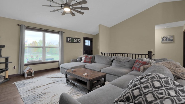 living room featuring hardwood / wood-style flooring, plenty of natural light, ceiling fan, and vaulted ceiling