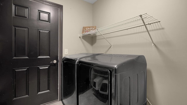 laundry room featuring independent washer and dryer