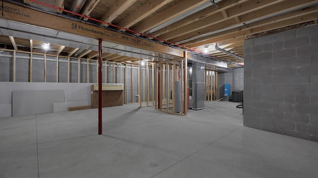 basement featuring water heater