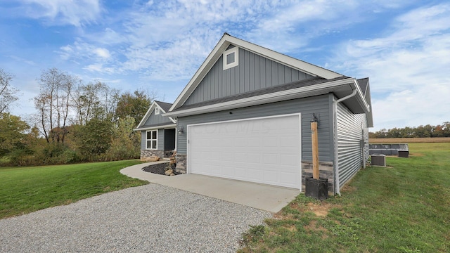 craftsman-style home with a garage and a front yard