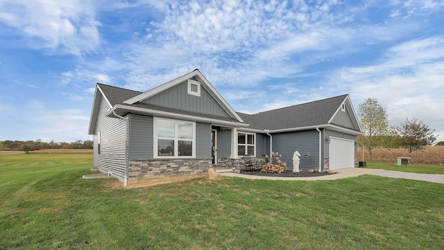 craftsman-style house with a front lawn and a garage