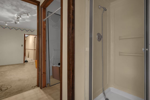 bathroom featuring walk in shower