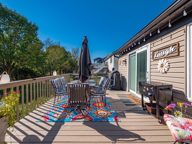 wooden terrace with grilling area