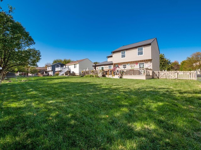 view of yard with a deck