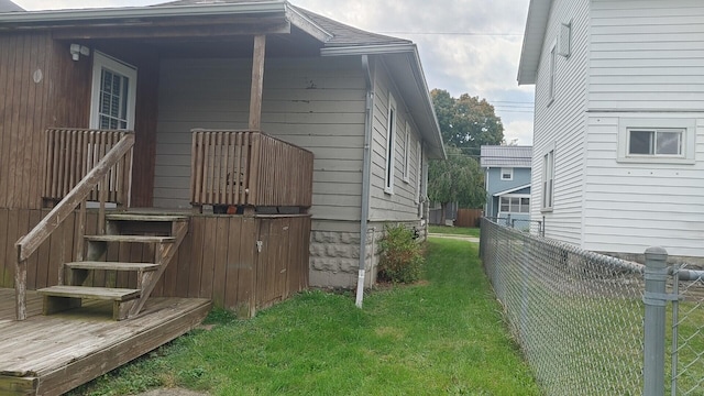 view of property exterior with a lawn