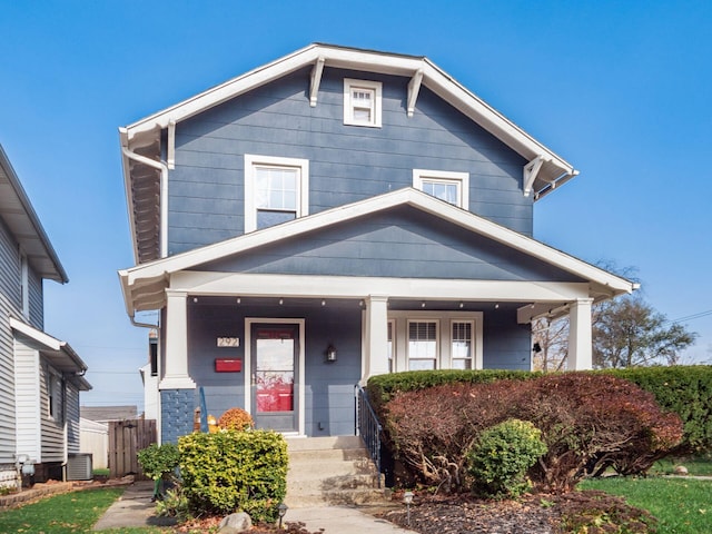 view of front facade with central AC unit and a porch