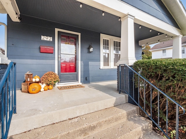 property entrance featuring covered porch