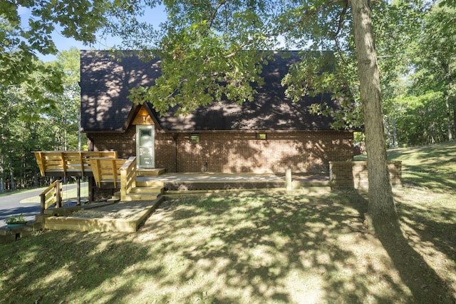 view of yard featuring a wooden deck