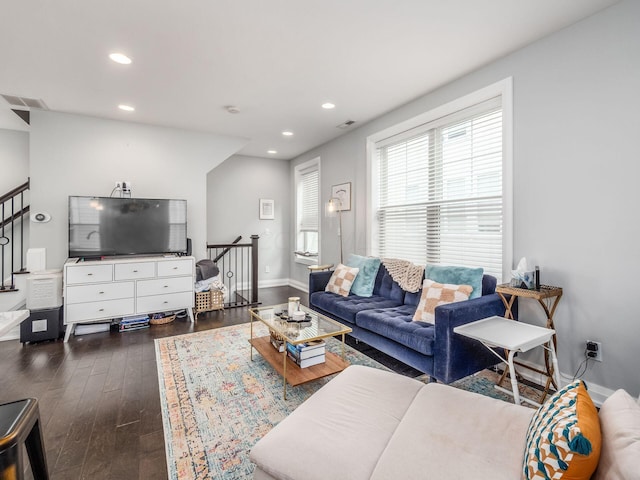 living room with dark wood-type flooring