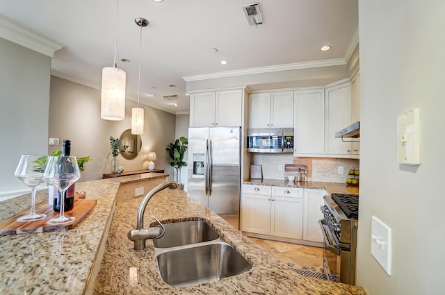 kitchen featuring white cabinets, appliances with stainless steel finishes, light stone countertops, and exhaust hood