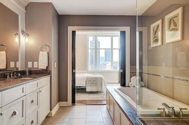 bathroom with wood-type flooring, vanity, and a bathing tub